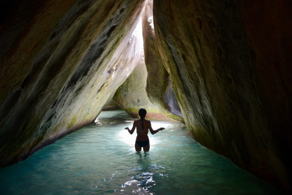 Among the giant granit boulders at The Baths. A geological wonder, The Baths are a collection of giant granite boulders forming caves, grottoes, and pools along the beach. This is a great place to go snorkel or climb around the beautiful formations.