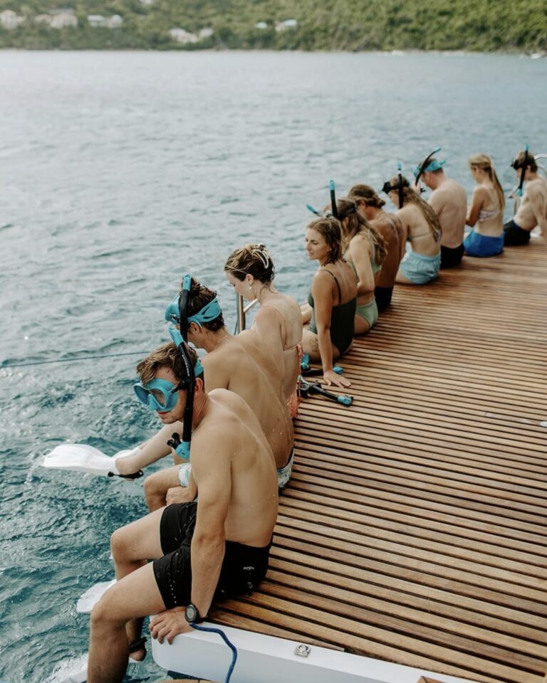 Charter Catamaran Ohana, guests on the swim platform getting ready for snorkeling