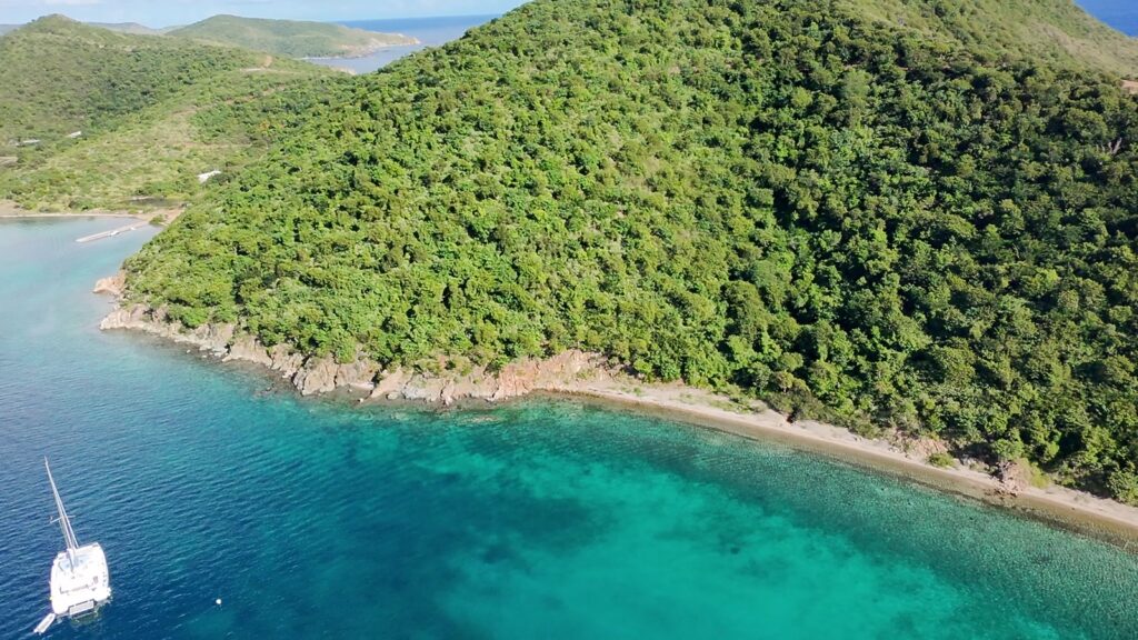 Cistern Point and the reef edge at the south end of Manchioneel Bay, Cooper Island, from the air, November 2025