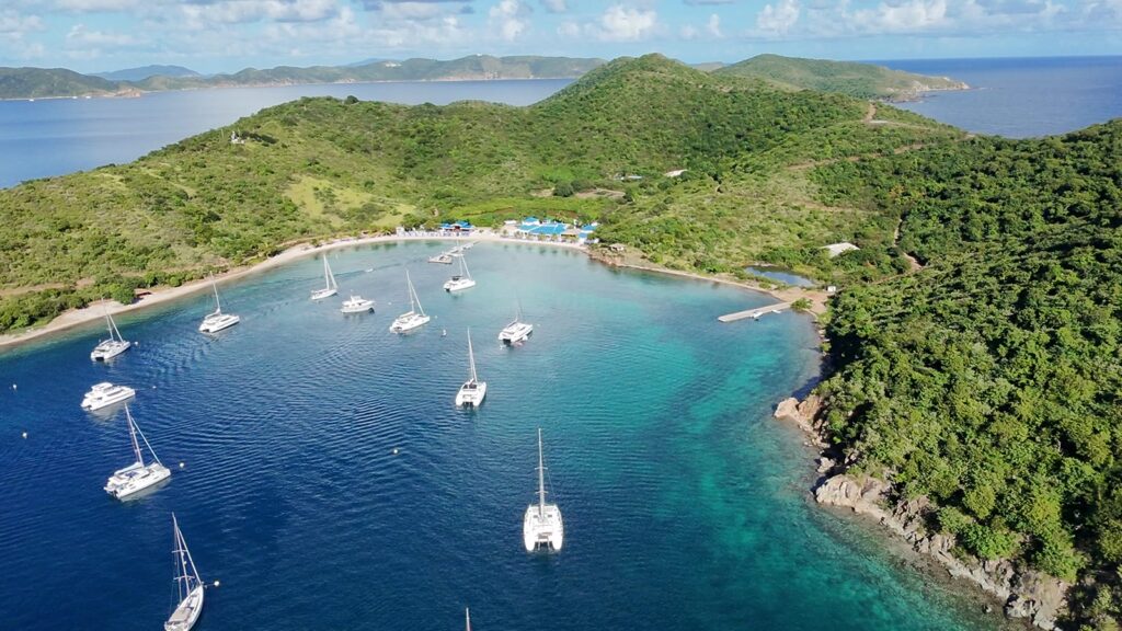 The Bight, Norman Island, full of catamarans from the air, November 2025