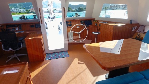 Saloon, interior helm station, and chart table.