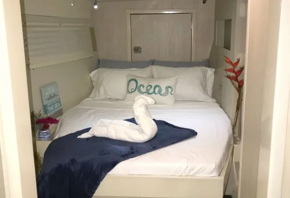 SOMEWHERE HOT Guest Queen Cabin Portside Forward