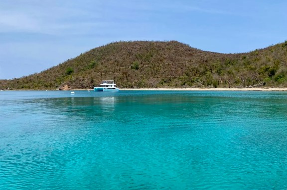 Power catamaran anchored in Benures Bay, Norman Island, BVI