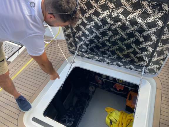 Captain Svetlin showing us the littium batteries onboard Catamaran Alena, EMMYS 2024, Poros, Greece