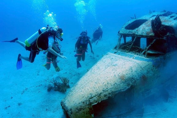 Sharkplane Dive Site at Dog Island, British Virgin Islands with Scuba Divers