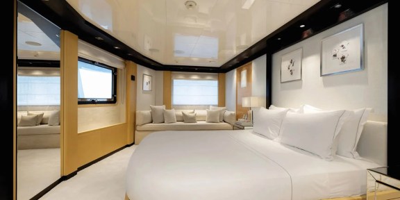 EMIR Luxury Cruisser Charter Golden Yachts 82M Conversions Executive Stateroom
