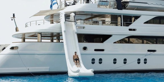 EMIR Luxury Cruisser Charter Golden Yachts 82M Conversions Water Slide