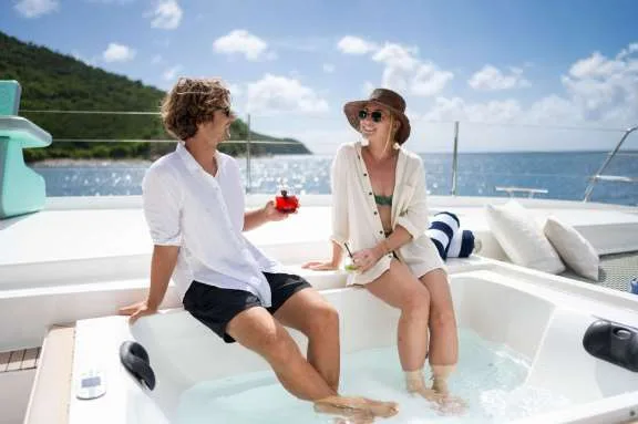 Soaking in the foredeck hot tub
