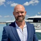 C.J., charter broker