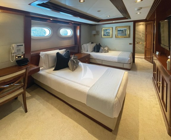 Perspective of the second convertible area on the lower deck guest quarters; flexible to Twins, or 1 King, or a lounge area.