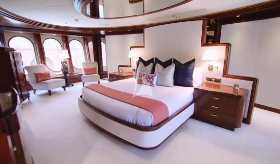A luxurious, full-beam master stateroom comes fully equipped with a King-sized bed, his and her en suite bathroom, with soaking tub and shower, large windows, a private office and a gym.