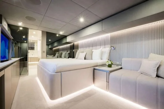 Mirrored master suite with king bed on Sunreef catamaran HALCYON