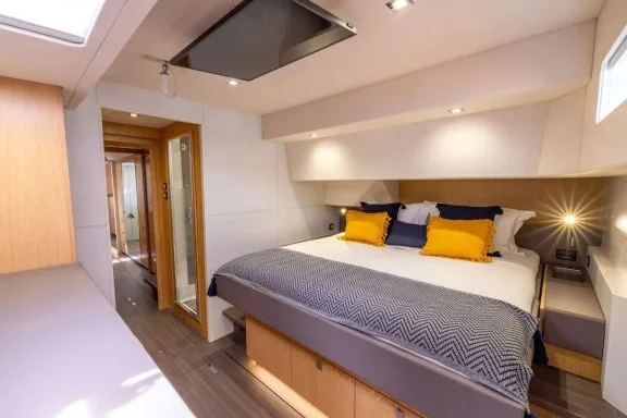 Center-line king bed in the owners version master cabin on SEGUNDO VIENTO, a Privilege 64