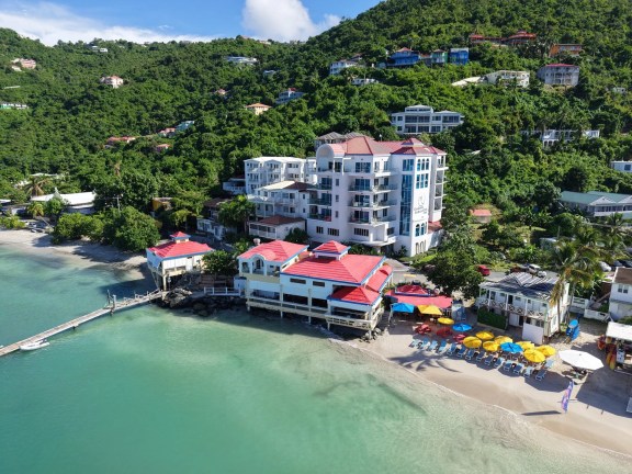 Aerial view of Cane Garden Bay Beach Hotel on the beach at Cane Garden Bay, Tortola