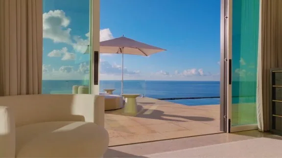 Villa terrace and infinity pool overlooking the sea at Oil Nut Bay, Virgin Gorda