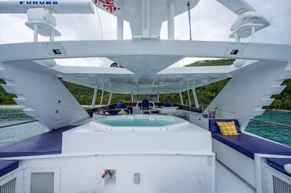 UPPER DECK WITH JACUZZI, WET BAR, AND DINING