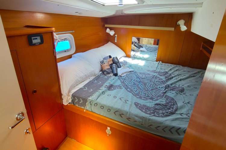Starboard Guest aft Stateroom Queen bed with ensuite head.
