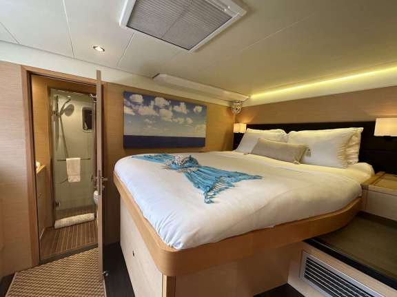 Queen size cabin with walk around bed.